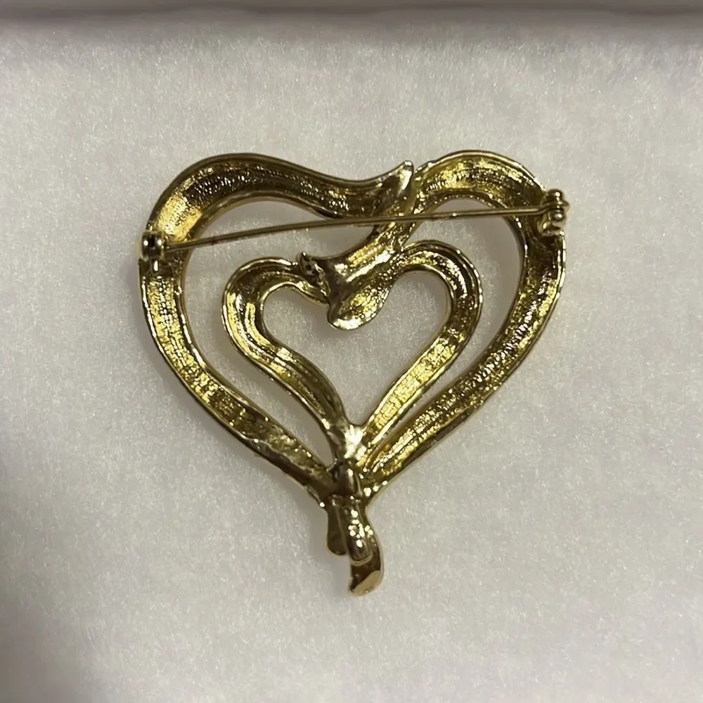 Elegant Golden AJC Brooch with Dual Hearts